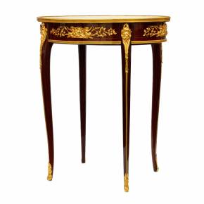 Magnificent mahogany and gilded bronze table by François Linke. 