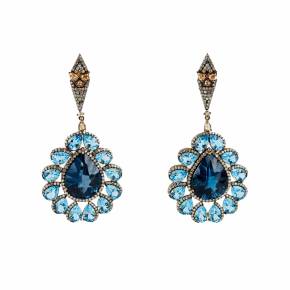 Silver earrings with topazes and diamonds. 