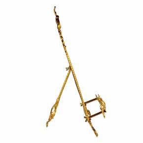 Table easel in gilded bronze in the Rococo style. 