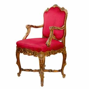 Magnificent, carved armchair in the Rococo style of the 19th and 20th centuries. 