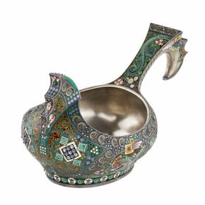A graceful silver ladle in the Russian Art Nouveau style of the 11th Moscow artel. Early 20th century.