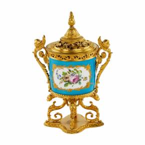 Bronze gilded aroma box with porcelain inlay in the Sevres style. The end of the 19th century 