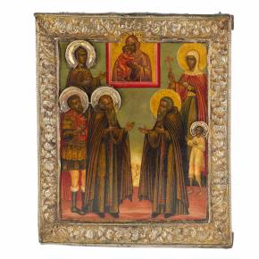 Russian icon of selected saints in a silver frame made of basma. 18th-19th century. 