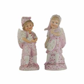 A pair of unglazed Easter figures of a boy and a girl from the Kuznetsov factory. Late 19th century. 