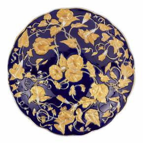 Plat en porcelaine bleu cobalt et or. Meissen. 20ième siècle.