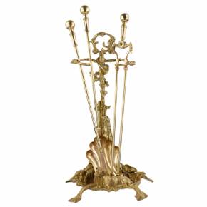 Brass-bronze fireplace set in historicist style. 19-20th centuries. 