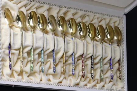 A set of 12 silver spoons