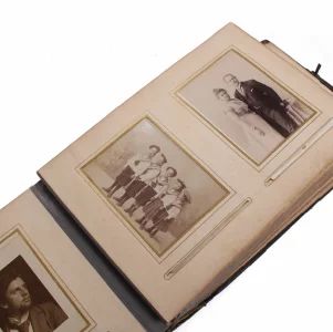 Photo Album with engraved silver overlays. 