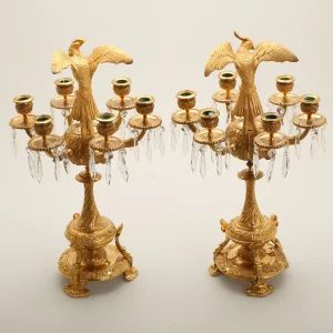 Pair of candelabra with figures of birds of paradise. 