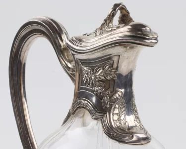 Crystal jug with a silver top.France. 19-20th centuries.