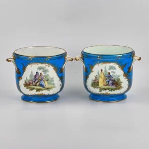 A pair of Sevres cachepots
