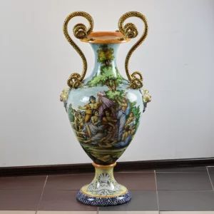 Vase de sol en majolique avec des serpents.