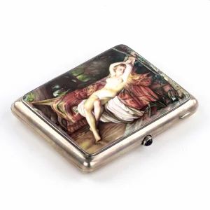Russian silver cigarette case with an erotic scene. 