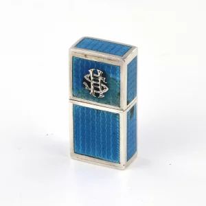 Miniature ladies lighter made of silver with guilloche enamel. 