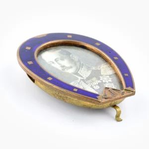 Photo frame in the shape of a horseshoe, with blue enamel from the late 19th century. 
