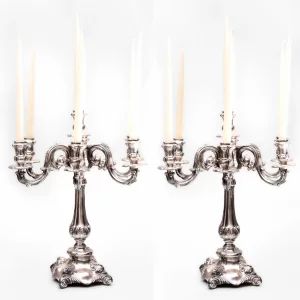 A pair of silver candlesticks. Vercelli 1920 century. 