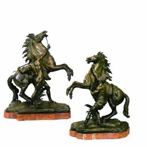 Sculptures jumelees "Chevaux Marley". 