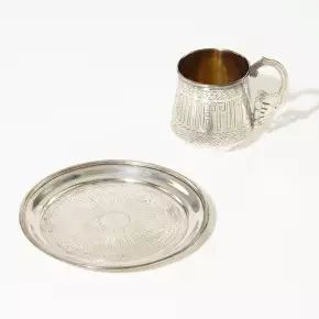 Russian silver cup and saucer. 