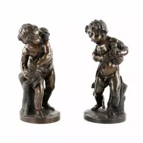 Pair of bronze figures of Putti. 