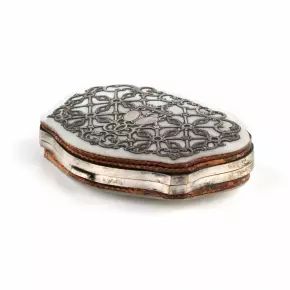 Sleek wallet with mother-of-pearl lids and hidden compartment. 
