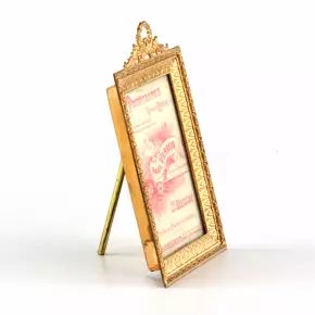 Photo frame of gilded bronze, neoampire style. 