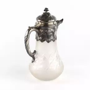 Silver water jug with engraved glass. 