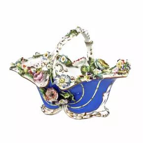 Porcelain vase-basket with molded flowers. 