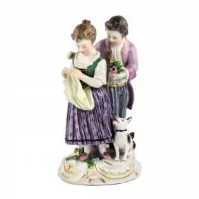 Groupe en porcelaine Couple avec un chien. Meissen. 