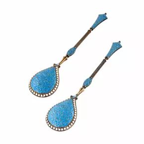 A pair of silver spoons with enamel. 