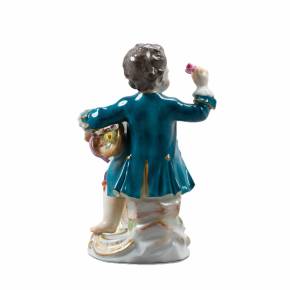 Porcelain figurine Boy with flowers. Meissen
