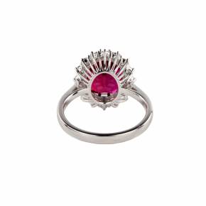 White gold ring with synthetic ruby and diamonds. 