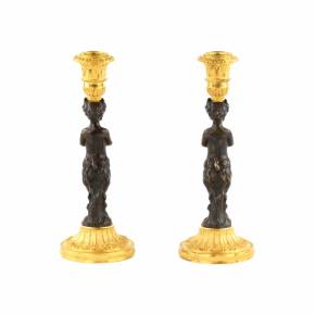 Pair of bronze, French candlesticks, in the form of fauns, mid-19th century. 
