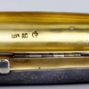 Russian silver cigar case and mouthpiece. 