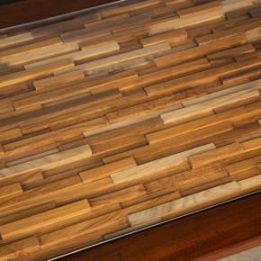 PERCIVAL LAFER. Table basse moderne faite de divers types de bois tropicaux. 