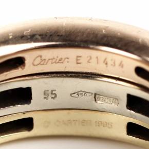 Gold ring with Cartier diamonds in the original case. 
