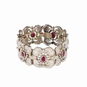 Gold bracelet with rubies and diamonds. 