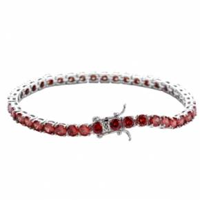 Tennis bracelet in 18k white gold with rubies. 