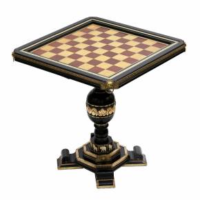 Chess table with figures in the style of Historicism. End of the 19th century. 
