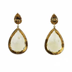 Large, drop-shaped earrings with topazes on silver. 
