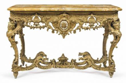 The Regency gilded wood console table was created circa 1720-1725.