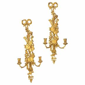 Pair of two-light gilded wood wall sconces in the Louis XVI style, 19th century