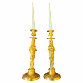 Pair of gilt bronze Retour d`Egypte candlesticks, Empire period, 19th century